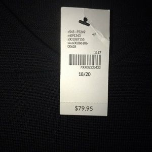 Comfy but classy black dress never worn.